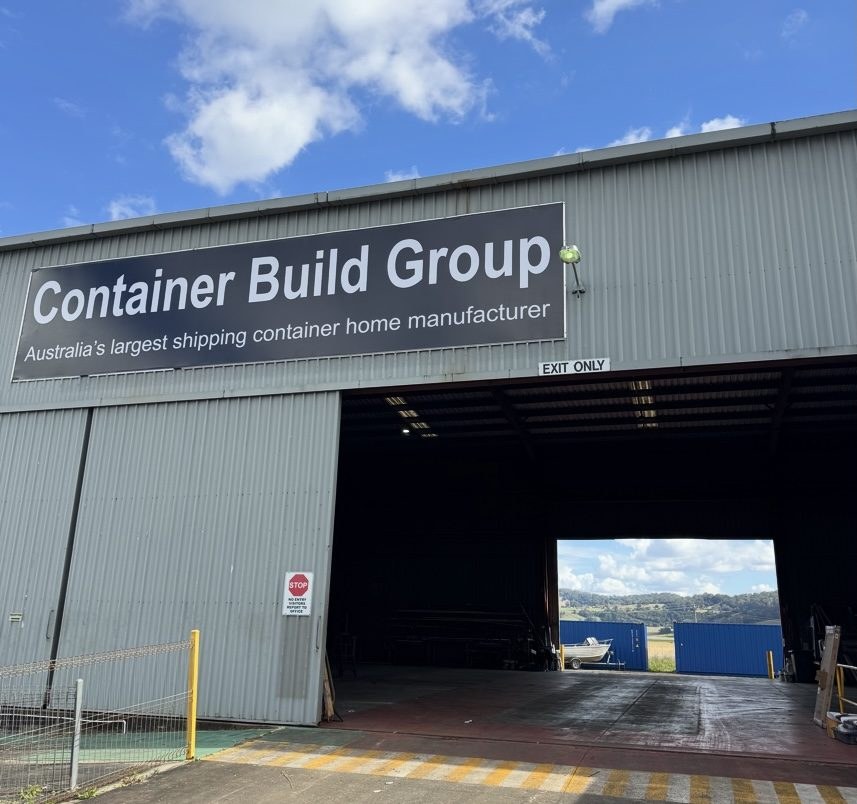 Container Build Group factory and showroom at 39 Habib Drive, South Lismore, with containers through the open bay