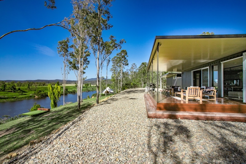 The Ranch off-grid container weekender beside the water