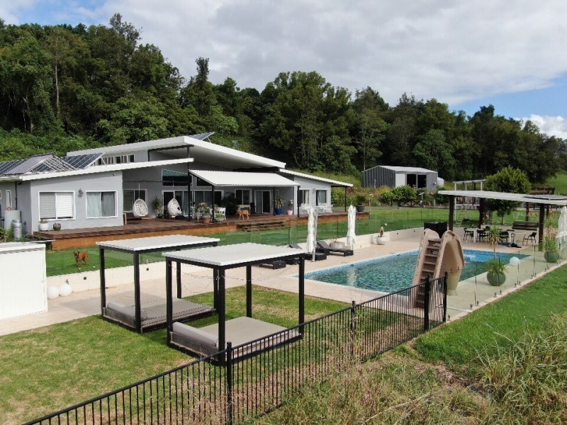 Hinterland luxury container home exterior with pool and timber deck