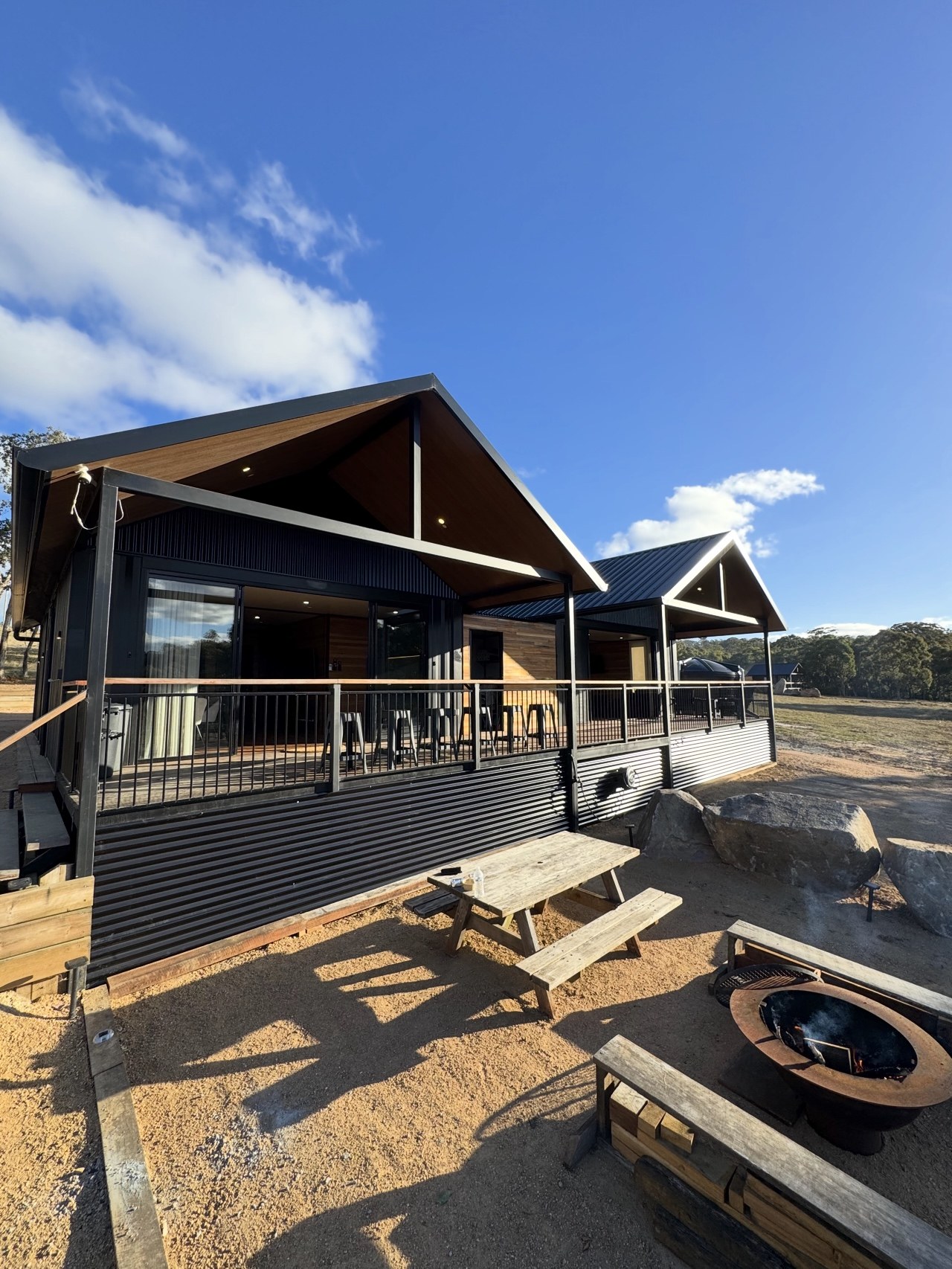 Boulder Ridge container home in Tenterfield with timber deck and fire pit