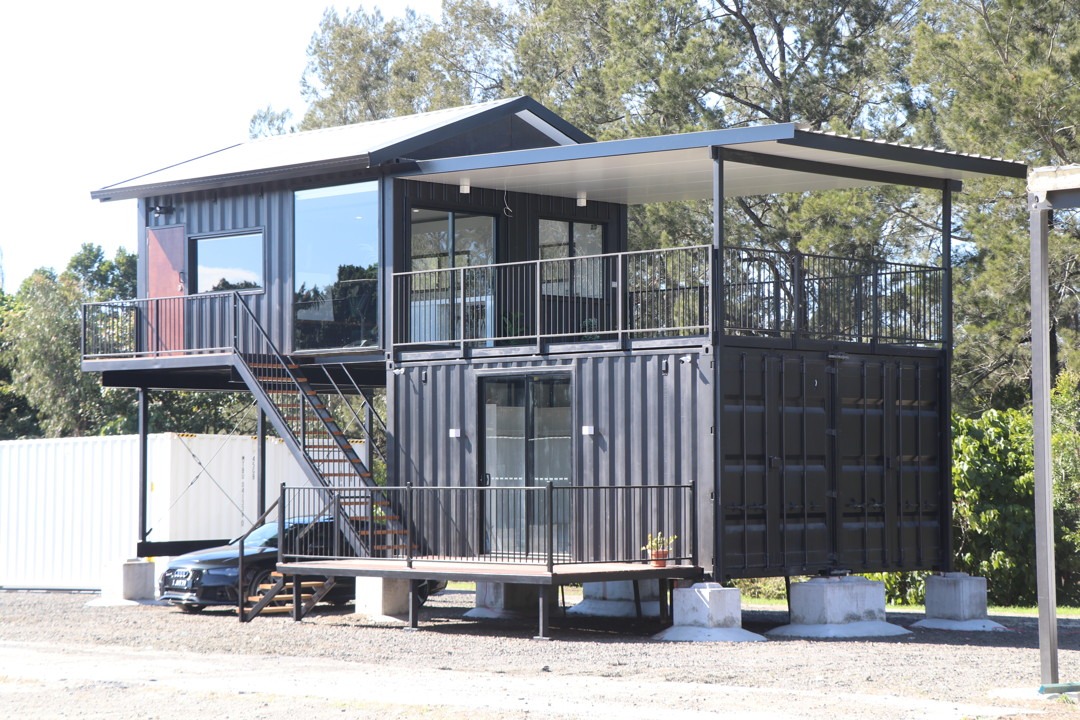 The Executive modular container home exterior with rooftop terrace and undercover parking
