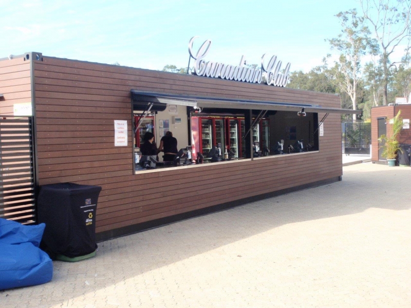 40ft shipping container main bar with timber-look cladding at the Brisbane Entertainment Centre, built by Container Build Group