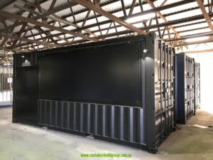 Black 20ft commercial kitchen container with the servery panel closed, in our Lismore factory