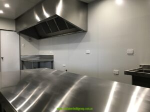 Stainless steel bench tops inside a 20ft commercial kitchen container