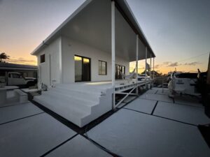 Burnett Heads, QLD — dusk exterior with covered porch
